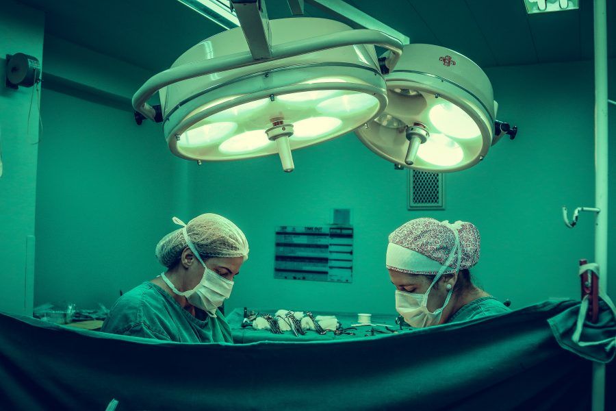 two surgeons doing surgery